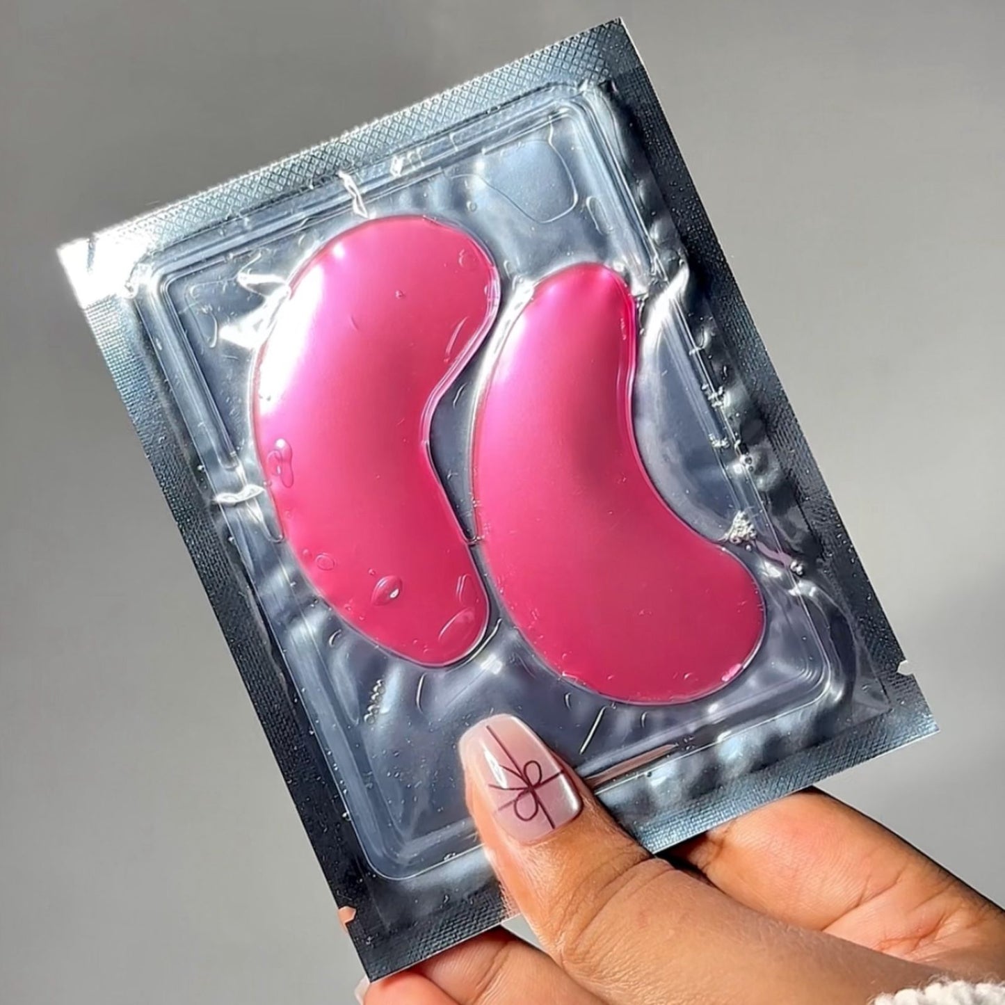 Soothing DHEO Collagen Under-Eye Patches — brighten tired eyes, smooth wrinkles, and firm skin with peptides, Vitamin C, and deep-sea collagen.