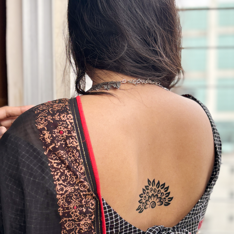 Compact and lightweight—each sheet carries multiple tattoo options.