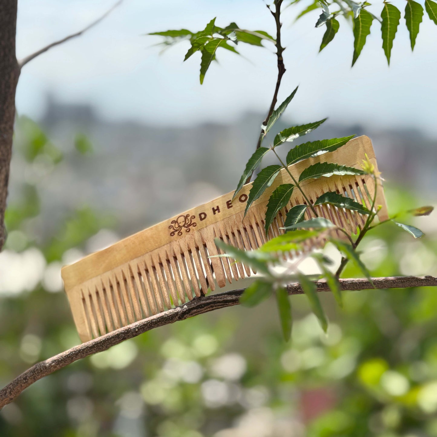 DHEO Neem Comb — natural wooden hair comb to reduce hair fall, prevent breakage, and promote a healthy scalp.