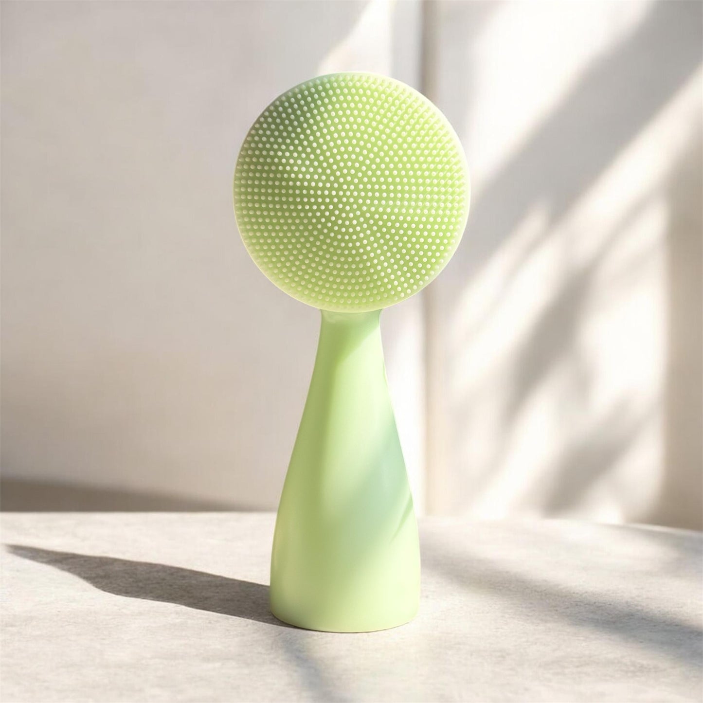 Close-up of the silicone bristle side of the DHEO Dual Cleansing Brush, designed for deep facial cleansing and unclogging pores.