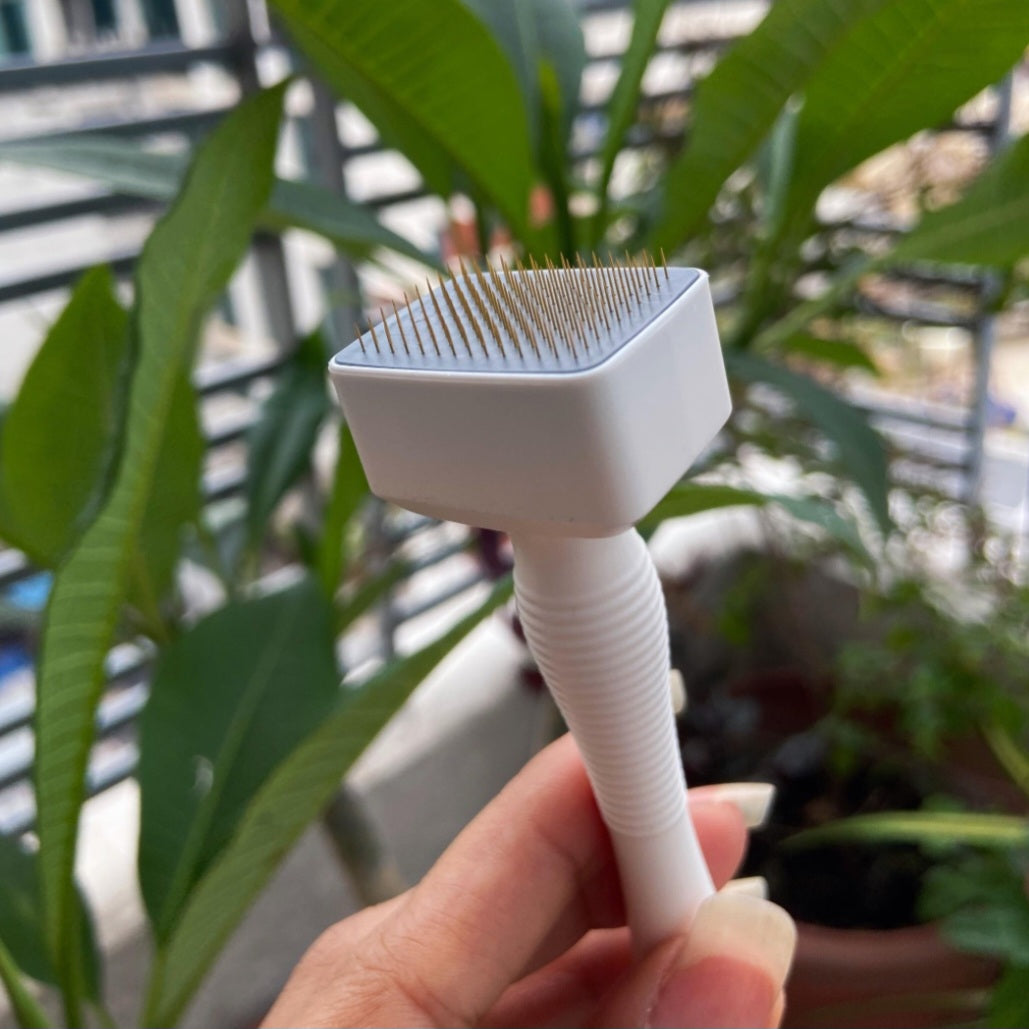 Close-up shot of the 24K gold-plated needle head of the DHEO Derma Stamp skin care tool.