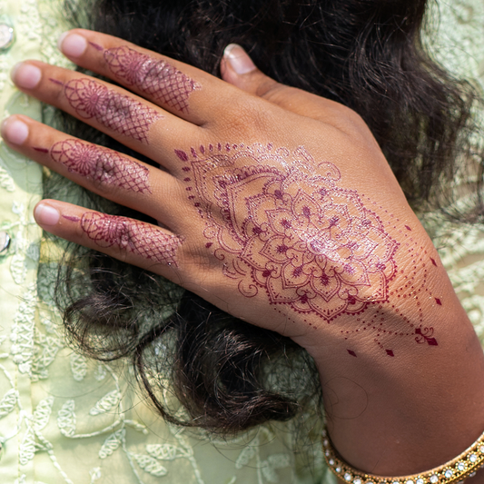 Your instant henna tattoo solution.No skill needed just stick, press, and reveal
