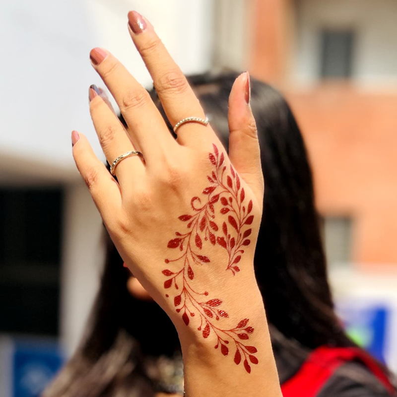 Skip the drying time—this henna tattoo applies in just 30 seconds with a damp cloth.