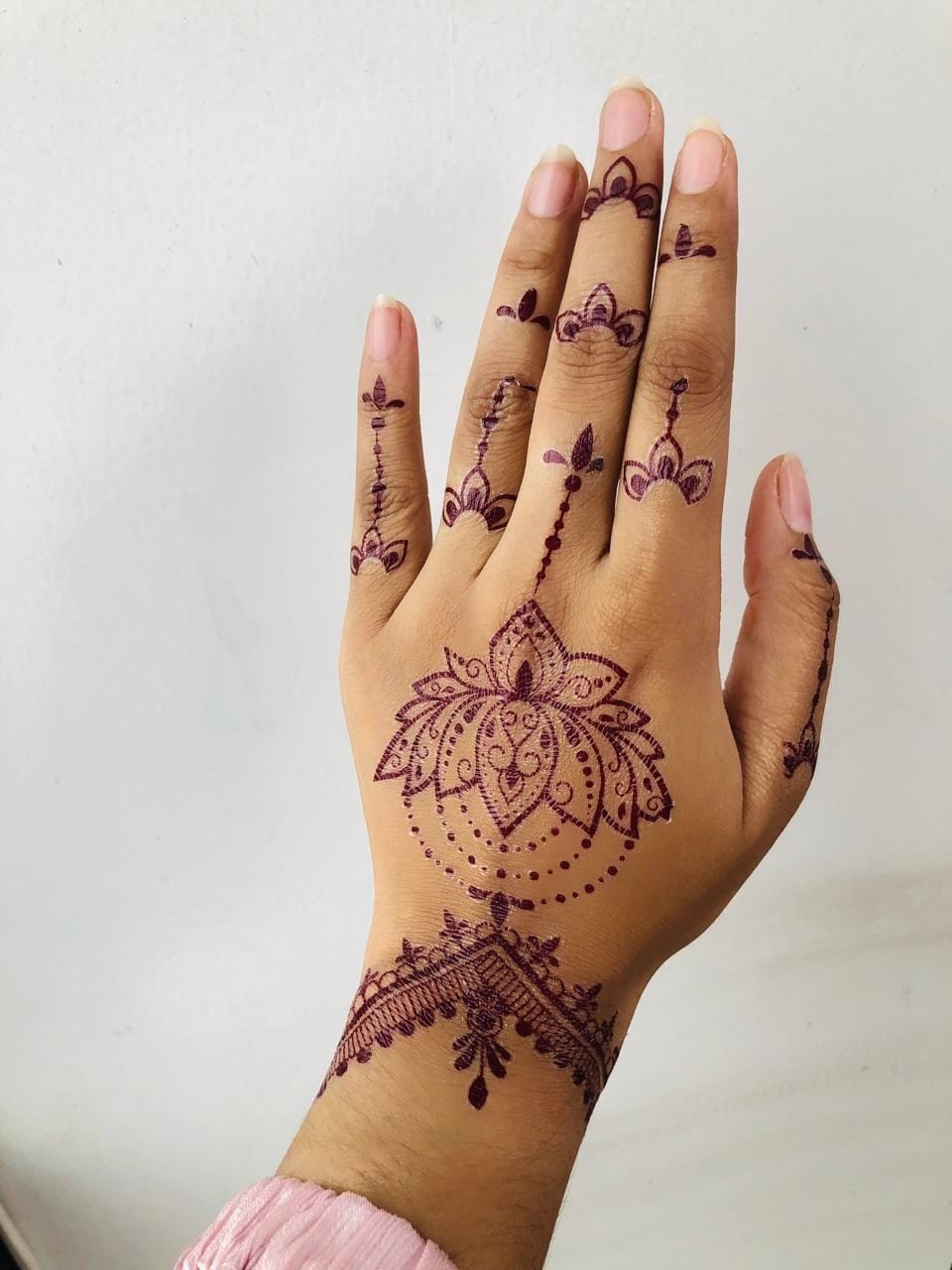 Non-permanent, water-resistant tattoos that fade naturally over days.

