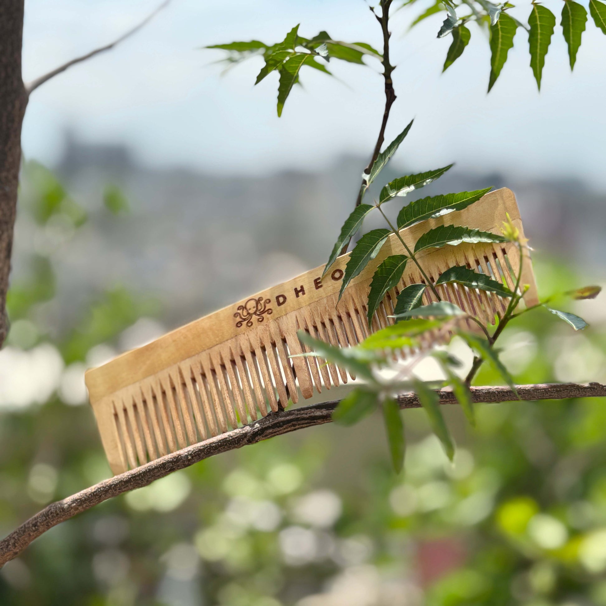 DHEO Neem Comb — natural wooden hair comb to reduce hair fall, prevent breakage, and promote a healthy scalp.