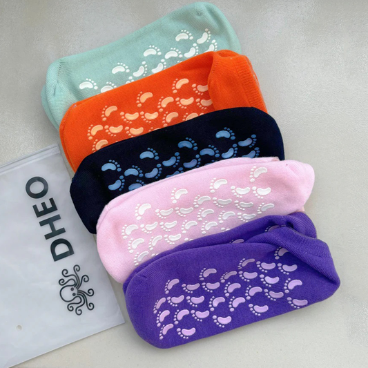 These cotton socks with silicone gel lining are infused with rose oil, olive oil, jojoba oil, and vitamin E. Wear on clean, dry feet for 20–30 minutes.