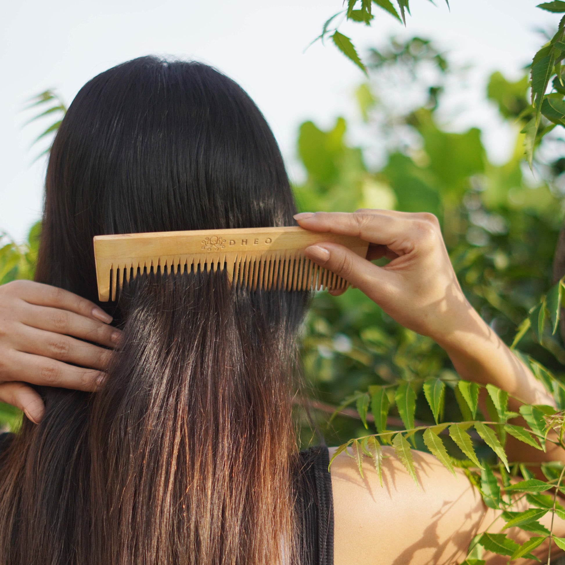 Eco-friendly DHEO Neem Wood Comb — antibacterial, antifungal hair care tool for stronger, smoother, and healthier hair.