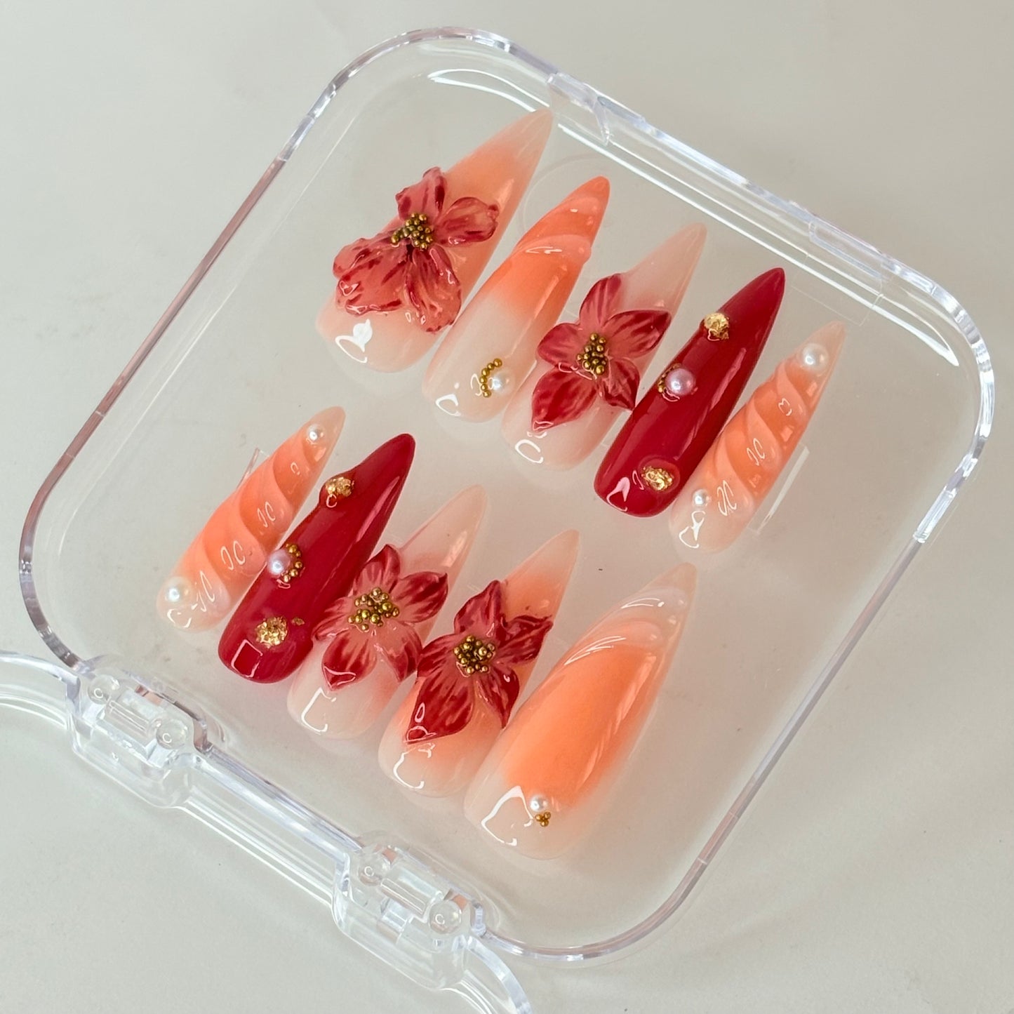 Meadow Bloom press-on nails flat-lay showing pastel green with wildflower art