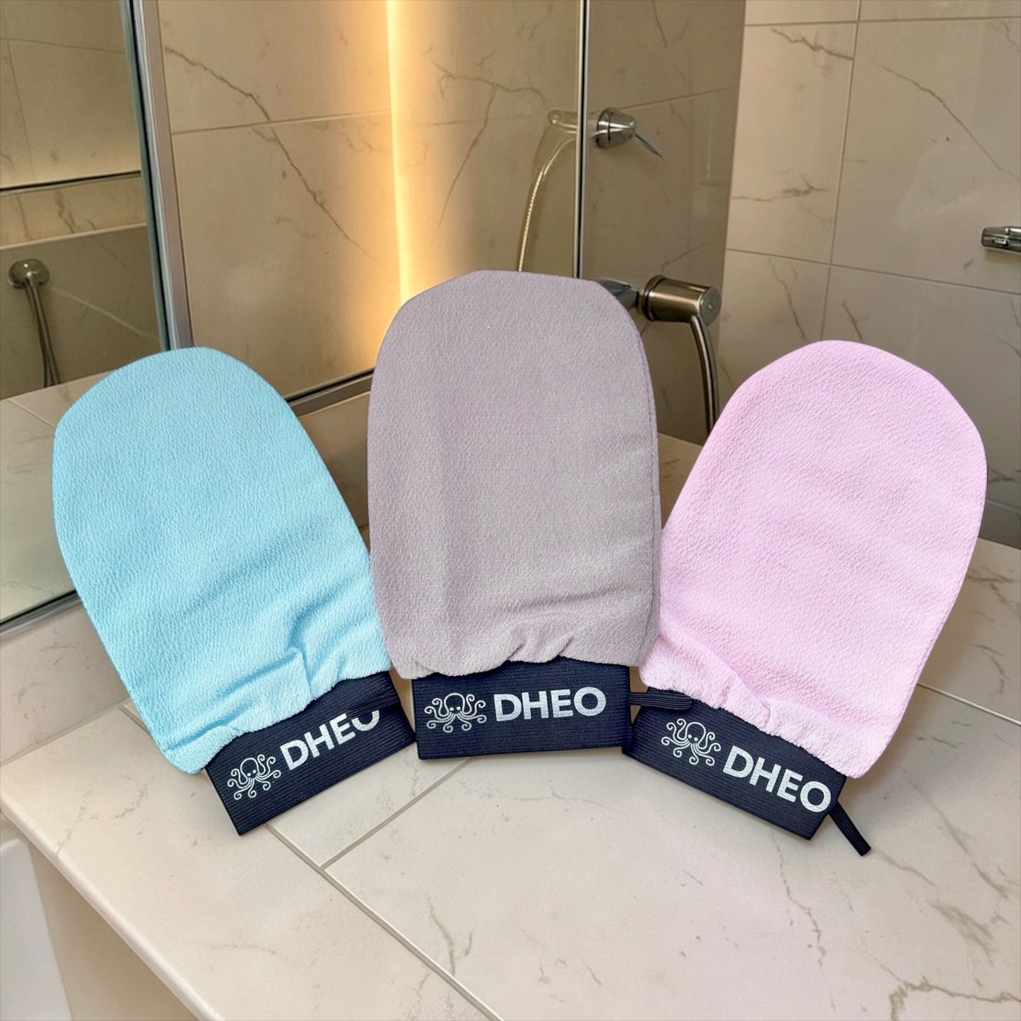 Deep exfoliating mittens for removing dead skin cells and brightening skin tone | DHEO