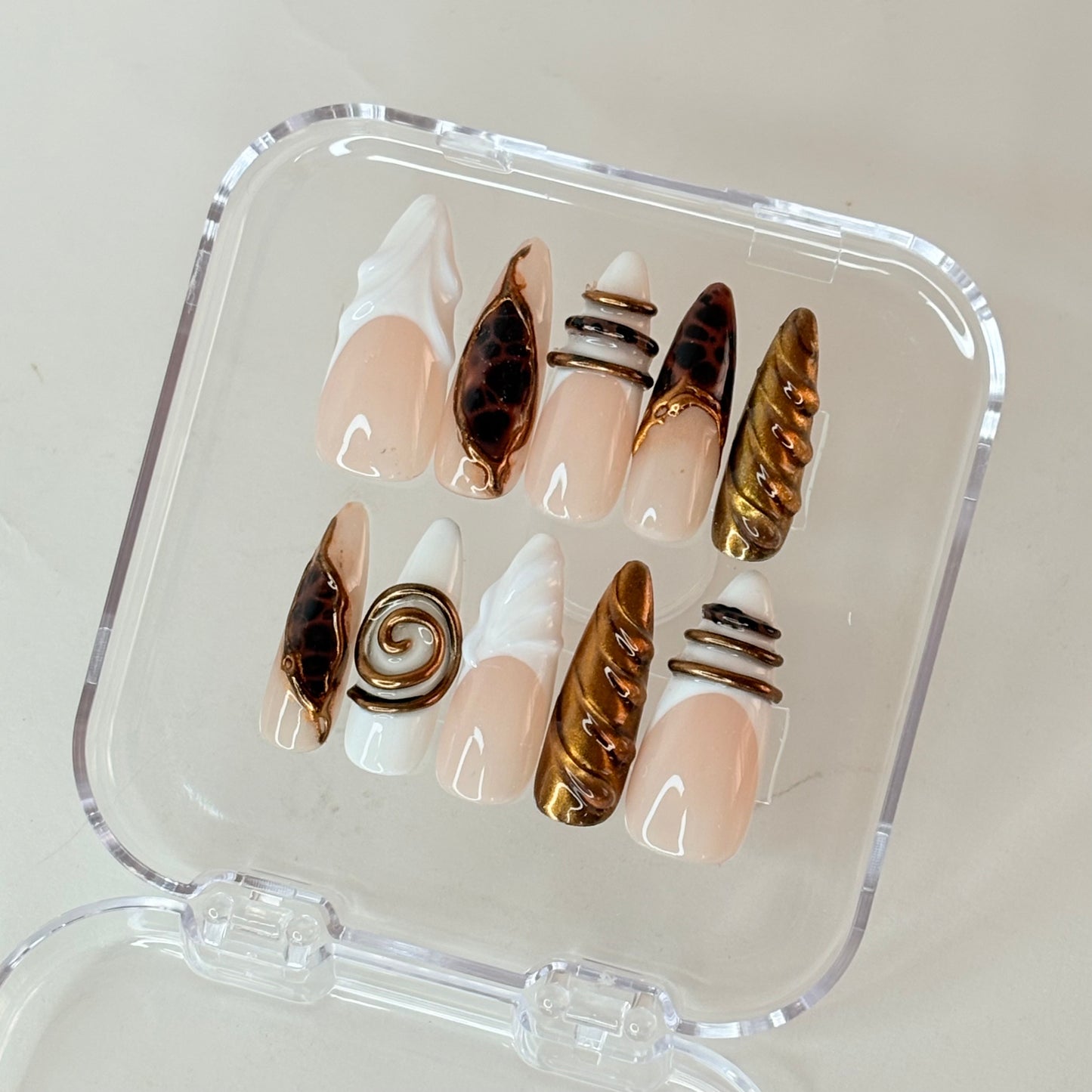 Midnight Mocha press-on nails flat-lay showing deep brown gel finish with shimmer