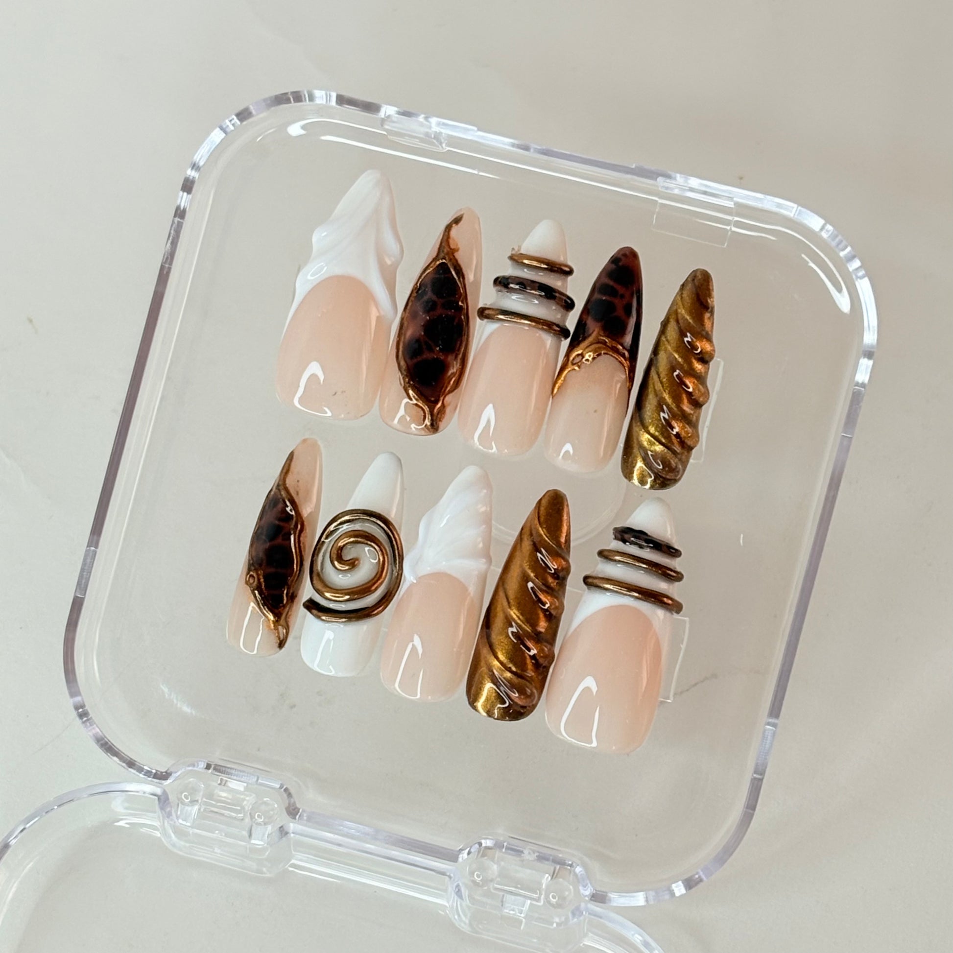 Midnight Mocha press-on nails flat-lay showing deep brown gel finish with shimmer