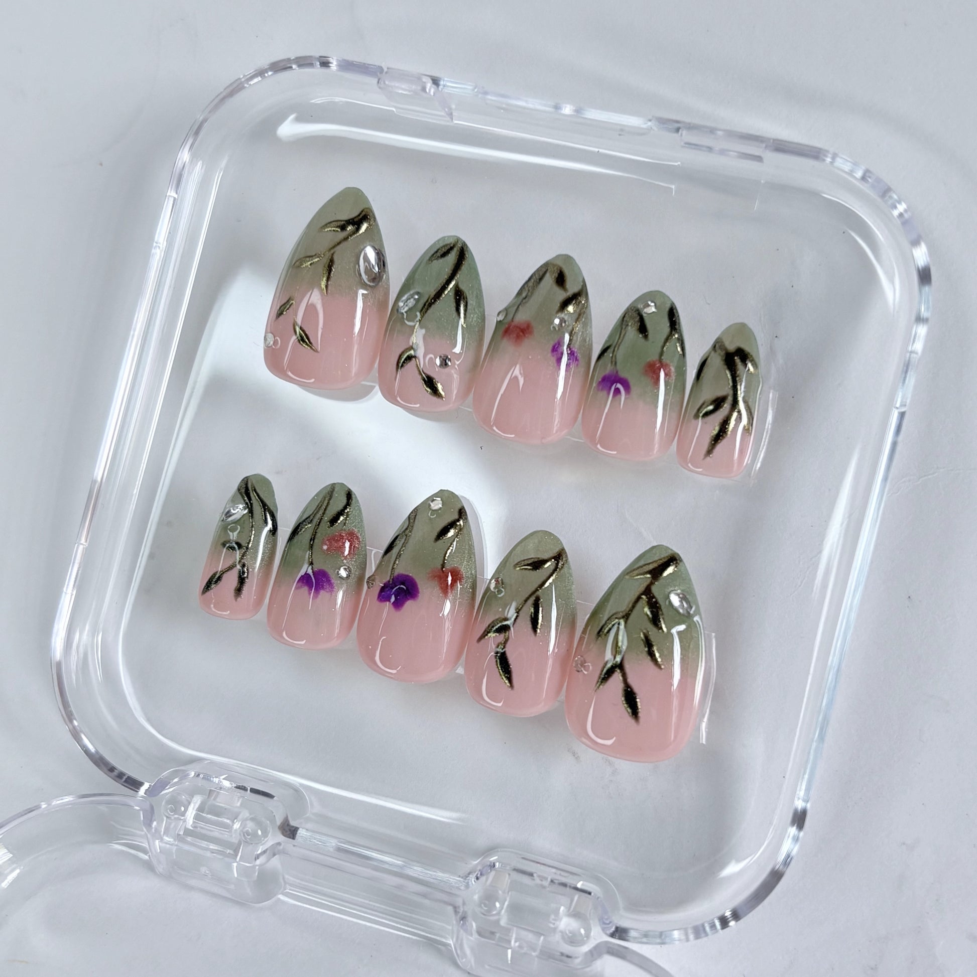 Sage Serenity press-on nails worn on hand showing calm sage green tone