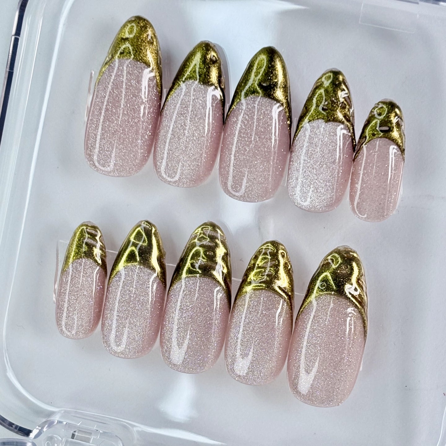 Gilded Olive press-on nails flat-lay showing olive green with gold gilded edge